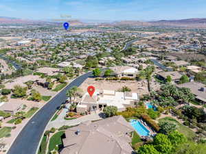View of property location featuring nearby suburban area and a mountainous background