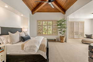 Carpeted bedroom with wood ceiling, recessed lighting, vaulted ceiling with beams, and ceiling fan