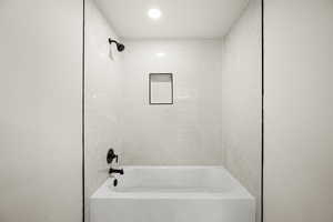Full bathroom with bathtub / shower combination and recessed lighting