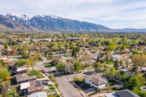 Aerial view of residential area with a mountainous background
