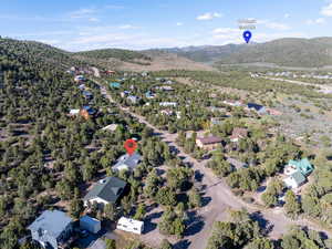 View of property location with nearby suburban area