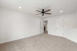 Unfurnished bedroom with carpet flooring, a ceiling fan, and recessed lighting