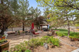 View of patio / terrace featuring a gazebo