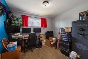Office area featuring carpet floors