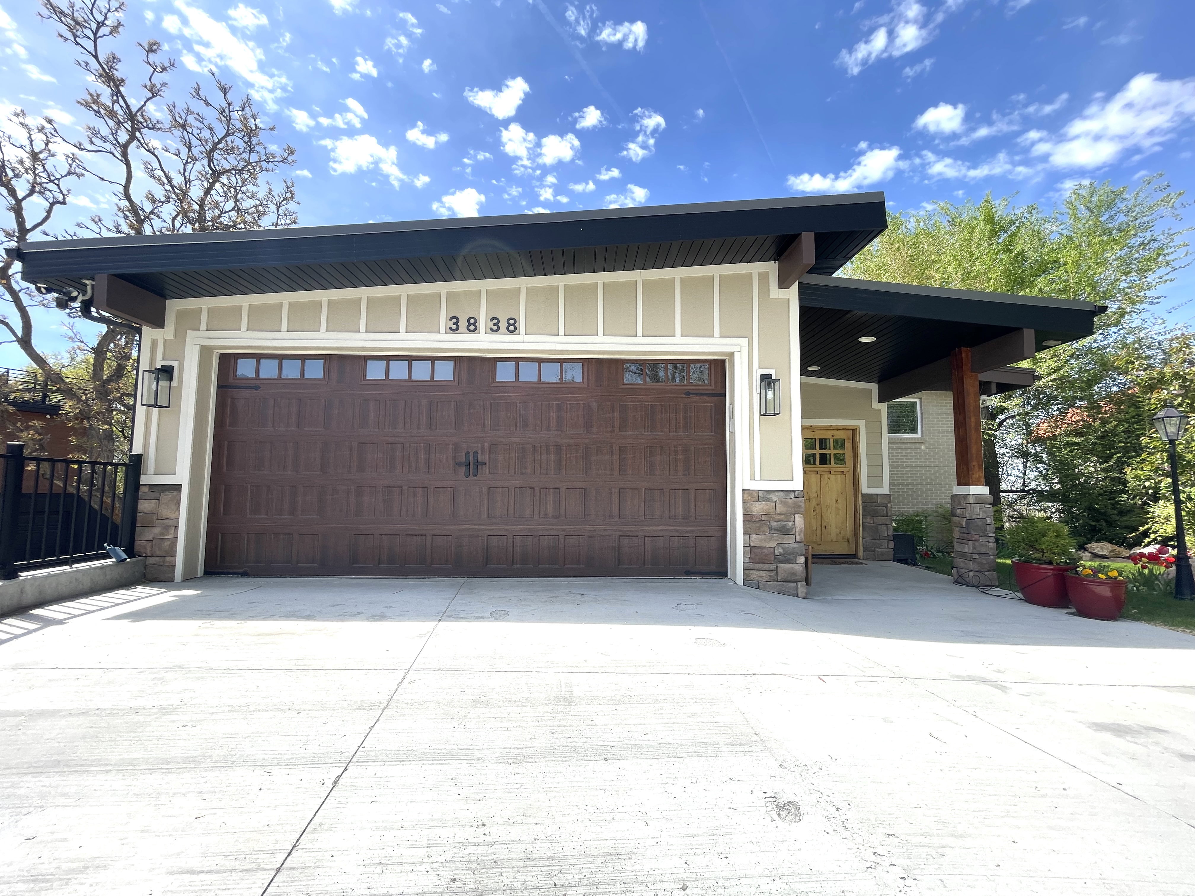 Garage featuring concrete driveway