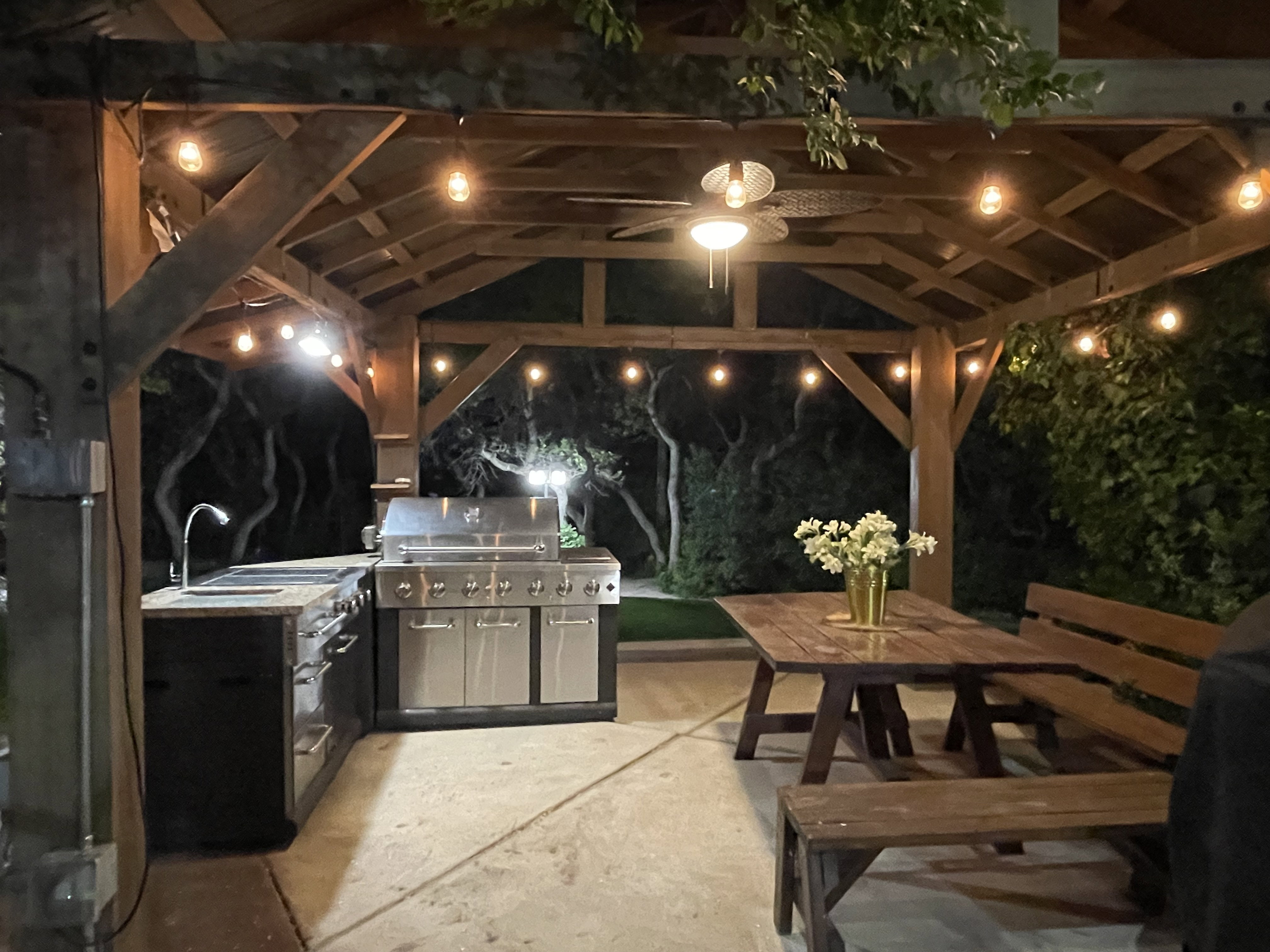 View of patio / terrace featuring an outdoor kitchen / dining area and a sink