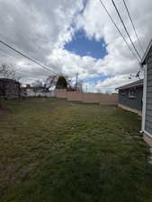 View of fenced backyard