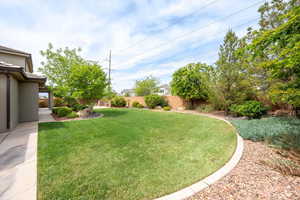 View of fenced backyard