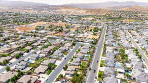 Aerial perspective of suburban area with mountains