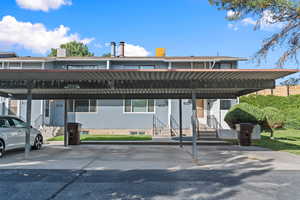 Covered parking lot with entry steps