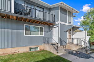 Entrance to property with a yard