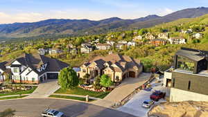 Aerial view of residential area featuring a mountain backdrop