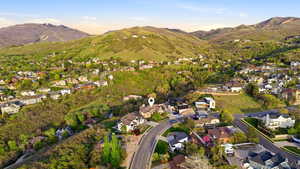 Aerial view of residential area featuring a mountain backdrop