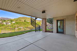 View of patio / terrace with a mountain view