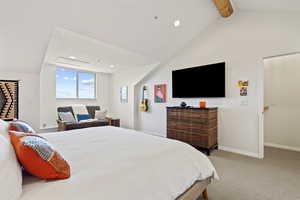 Bedroom featuring light carpet, recessed lighting, and beam ceiling