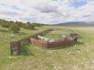 View of yard featuring a view of countryside and a mountain view