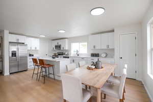 Dining room featuring light wood-type flooring