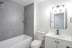 Full bathroom featuring vanity and bathtub / shower combination