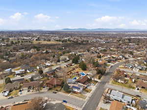 Aerial view of residential area with a mountain backdrop
