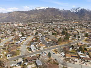 Aerial view of residential area featuring mountains