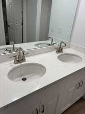 Bathroom featuring double vanity
