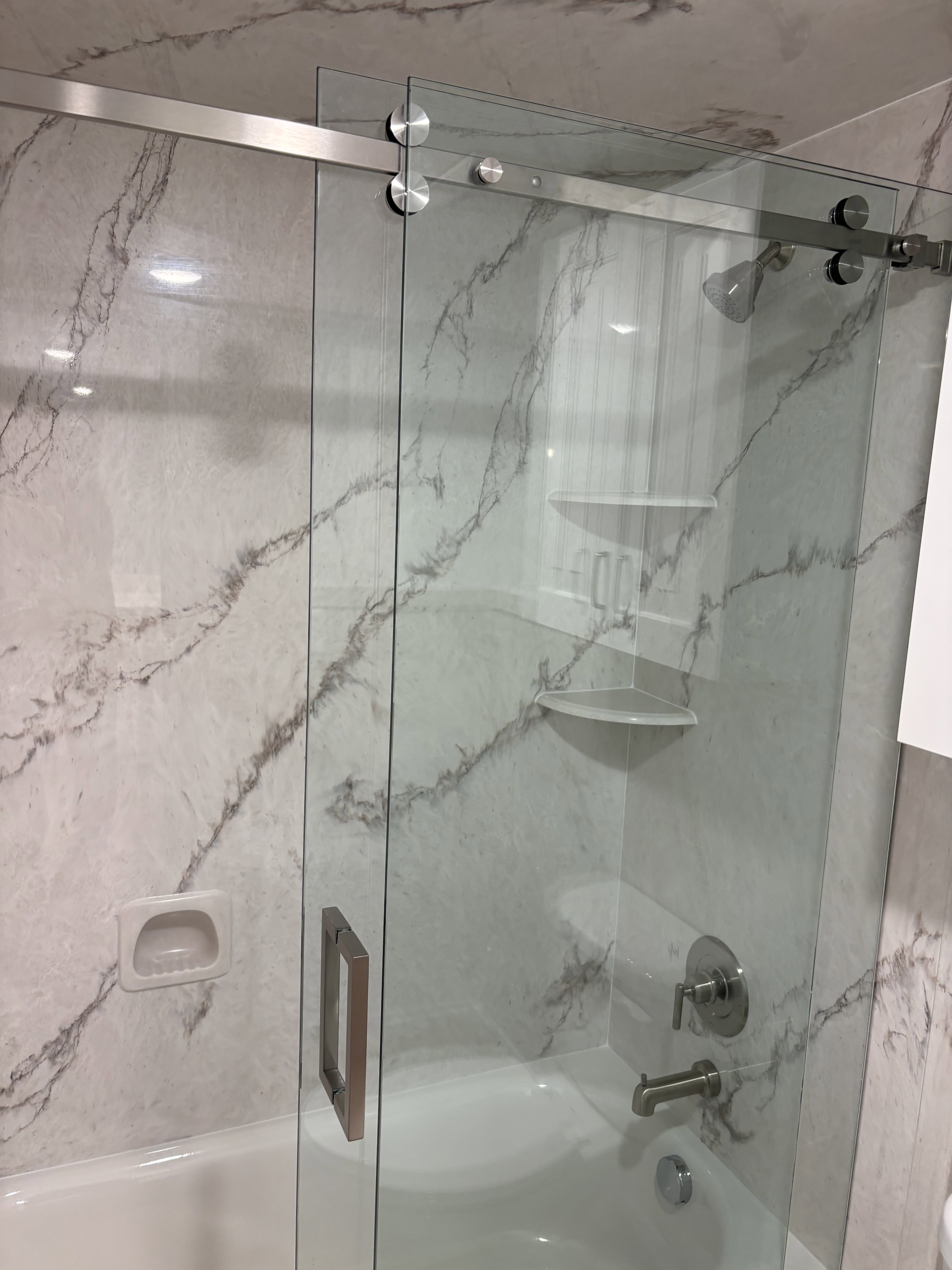 Full bath with enclosed tub / shower combo