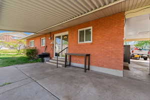 View of patio / terrace featuring grilling area and entry steps