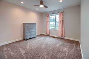 Carpeted spare room featuring recessed lighting and ceiling fan