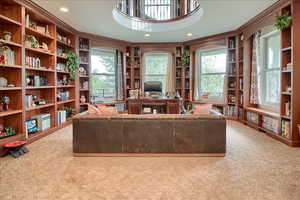 Office space with plenty of natural light, recessed lighting, and carpet floors