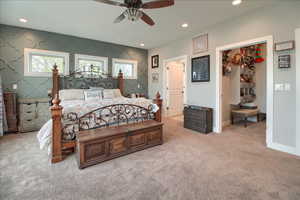 Master Bedroom featuring light colored carpet, a ceiling fan, recessed lighting