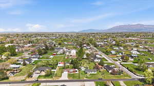 Aerial view of residential area with a mountain backdrop