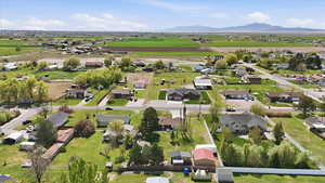 Aerial view of residential area featuring a mountain backdrop