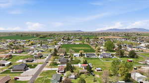 Aerial view of residential area featuring a mountain backdrop