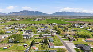 Aerial view of residential area featuring mountains