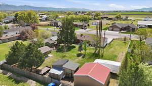 Aerial perspective of suburban area with a mountain backdrop