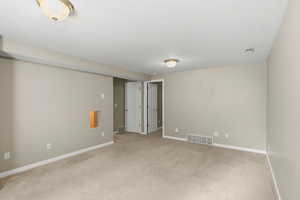 Basement family room view from corner.