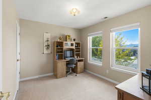 2nd level bedroom staged as an office.