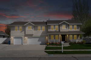 Front of house at twilight.