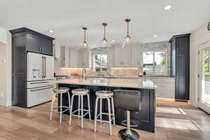 Main Level Kitchen. Quartz Counters. Cafe' Appliances, Ice Maker