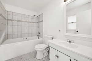 Full bathroom featuring vanity and  shower combination