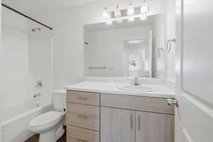 Main Bathroom with vanity and bathtub / shower combination