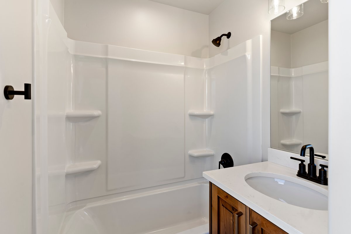 Full bathroom featuring vanity and bathtub / shower combination