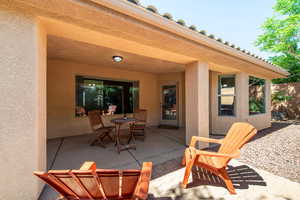View of patio with outdoor dining area