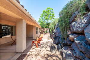View of yard with a patio