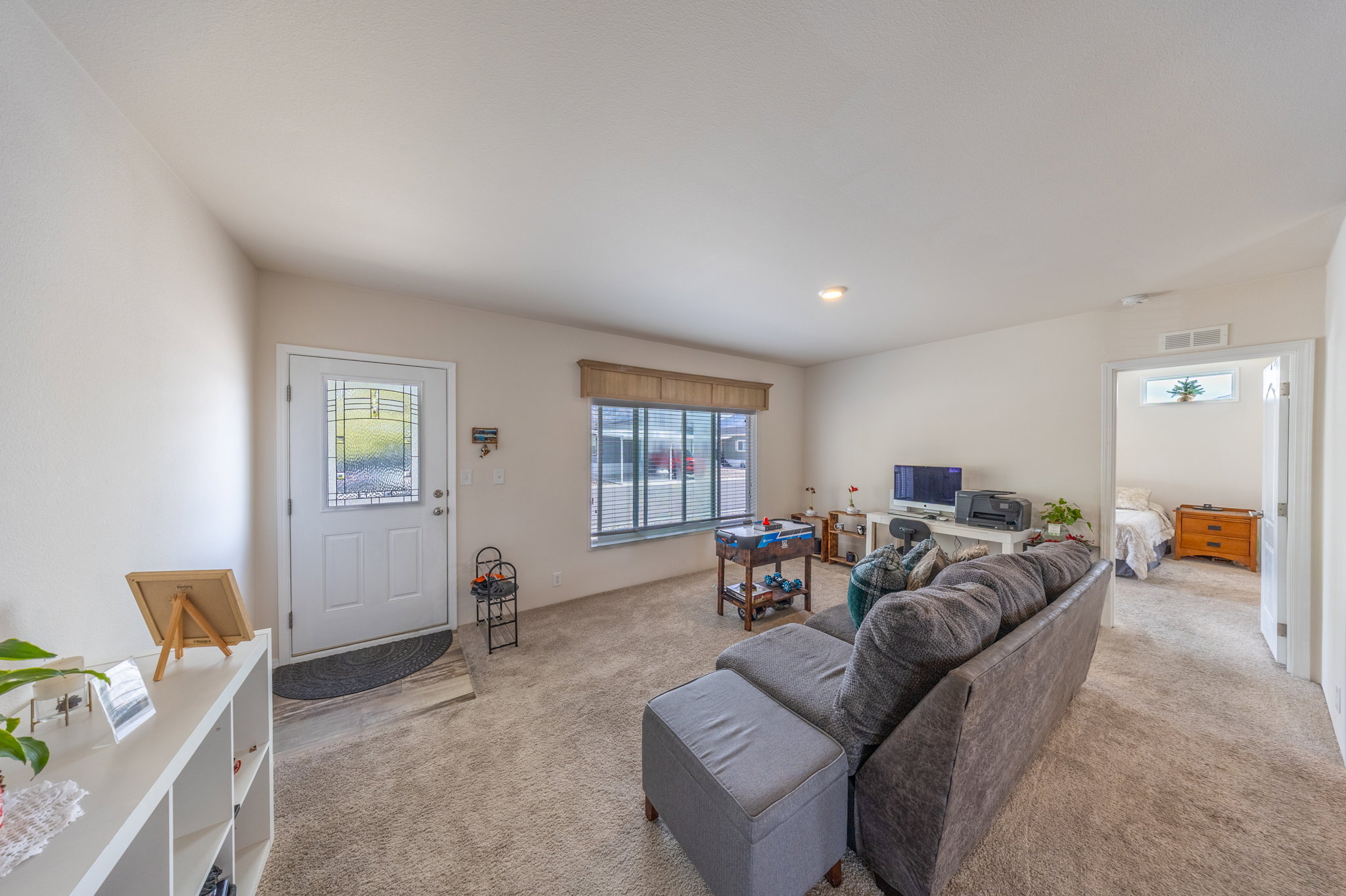 Living area with light carpet