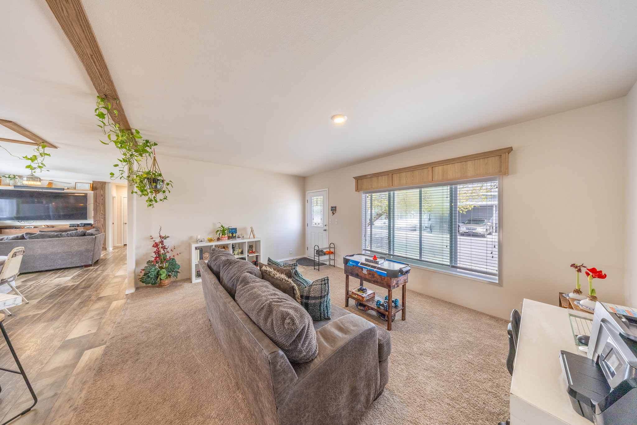 Living room with light colored carpet