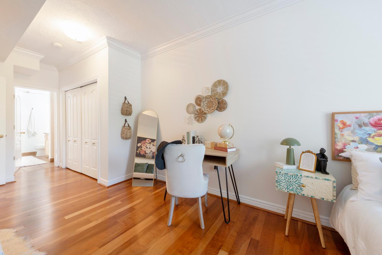 Rich wood-finish flooring throughout