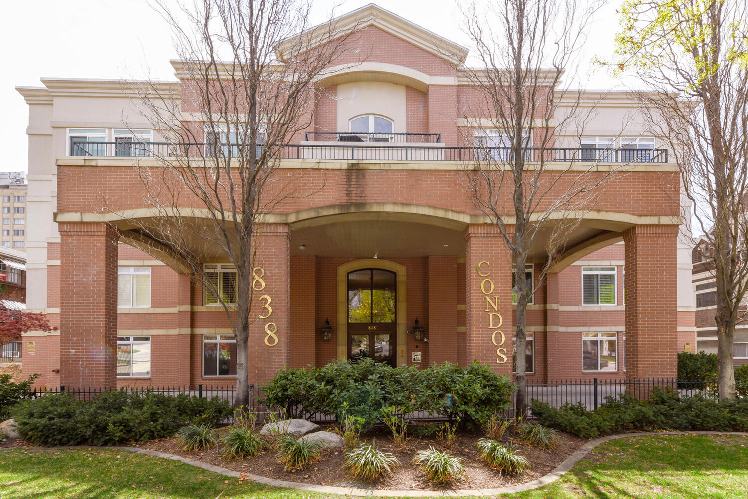 View of front of home featuring brick siding