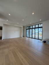 Unfurnished room featuring recessed lighting and light wood-type flooring