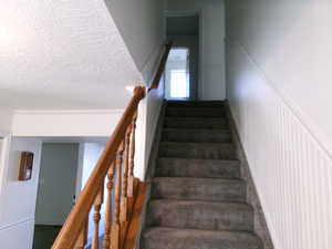 Stairs leading to upstairs bedrooms